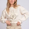 Sweater met NIKKIE university print