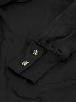 Top met col en open detail bij hals