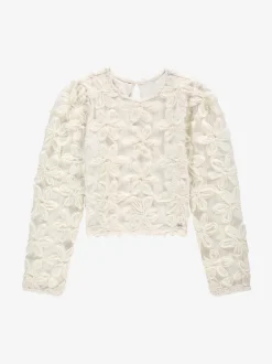 Top with embroidered flowers and mesh balloon sleeves