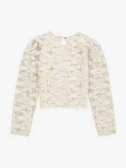 Top with embroidered flowers and mesh balloon sleeves